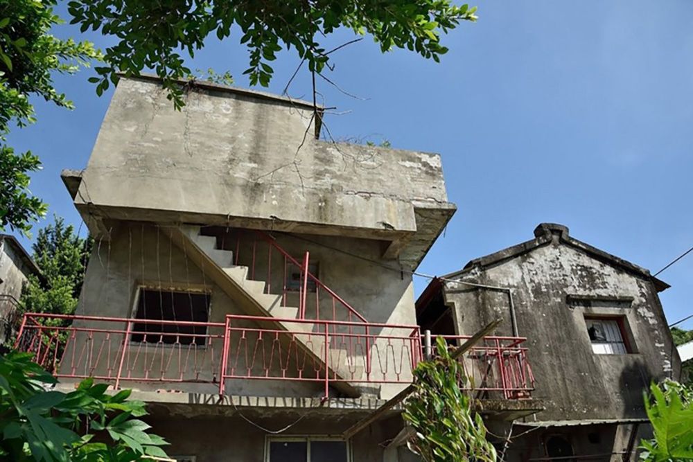 中興莊39號為兩樓半建築，住戶視需求而增建痕跡。照片提供：張清專